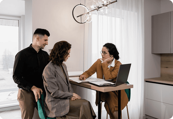 3 Persons On a Table Talking