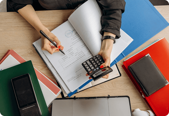 Men With Calculator and Paper Work